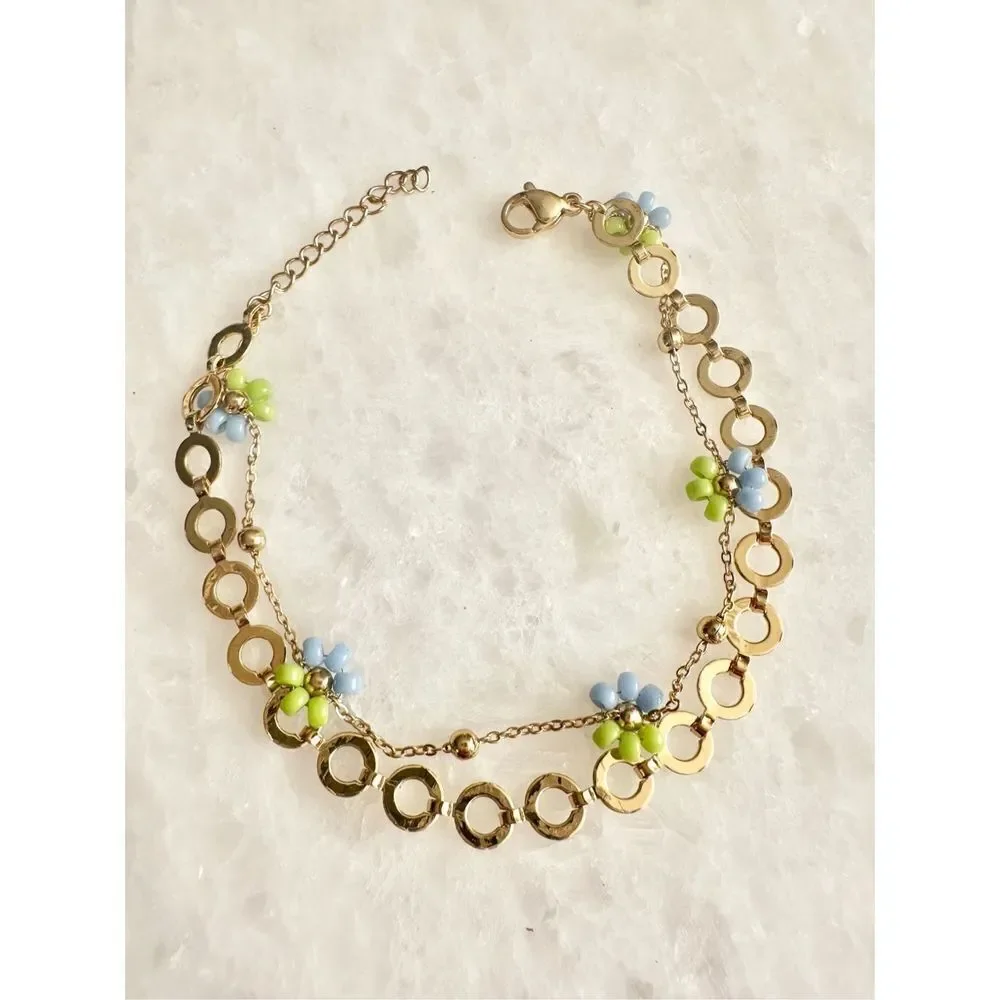 Delicate light blue and green beaded flower chain bracelet